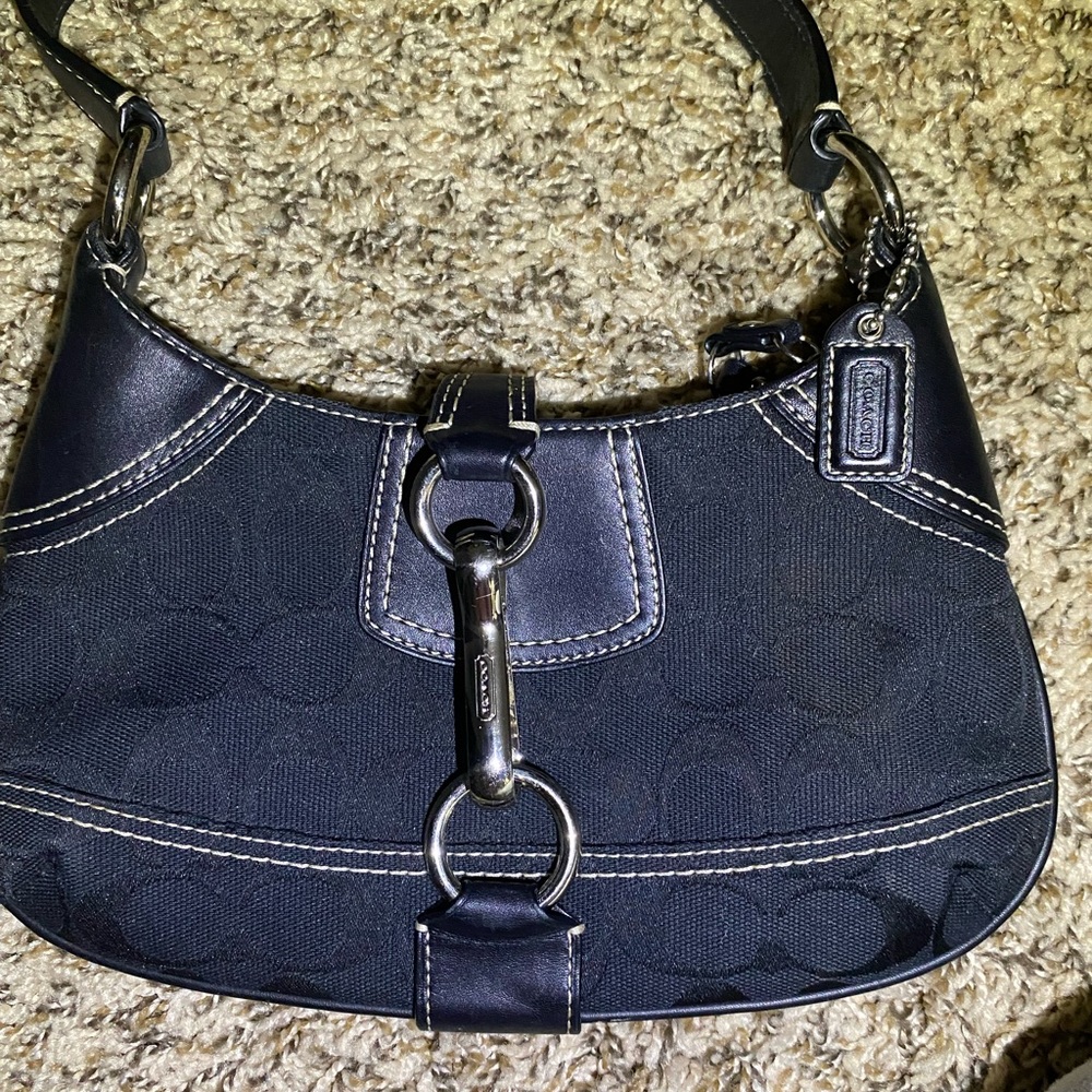 Coach Black Clutch with Sleek Design